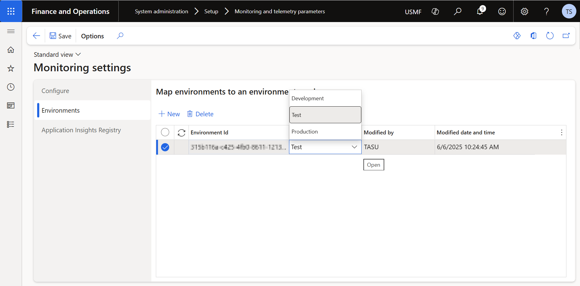 Monitoring settings Environments tab, mapping an environment ID to an environment type with Development, Test, and Production options in a dropdown.